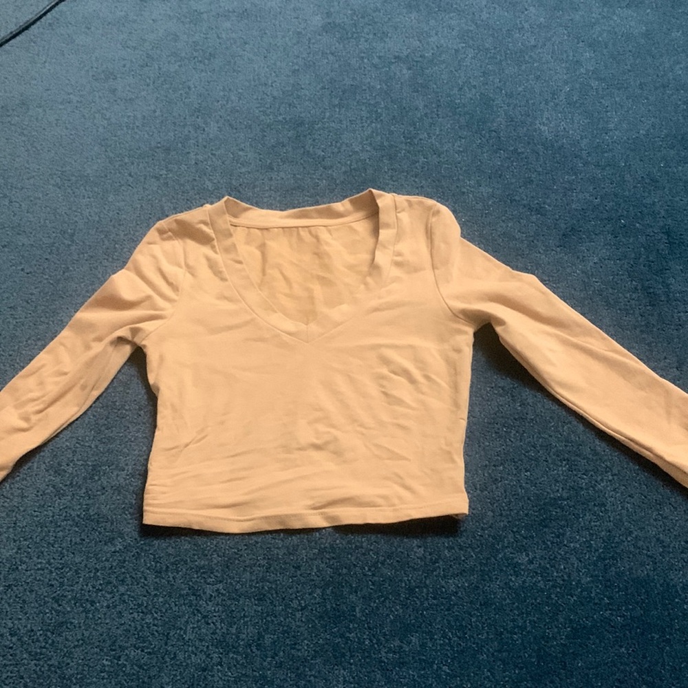 Long sleeve size XS nude cropped top